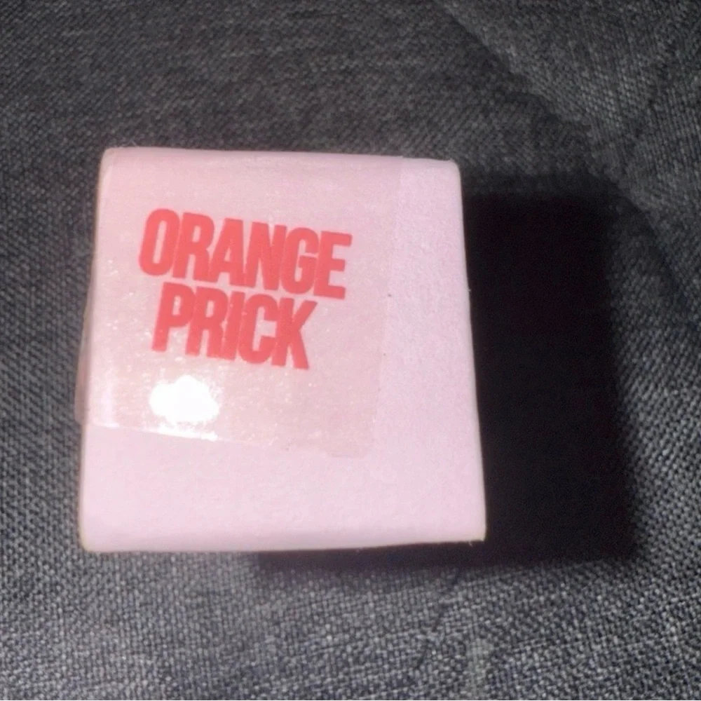 Jeffree Star Orange P Coral-Orange Lipstick in Pink Tube